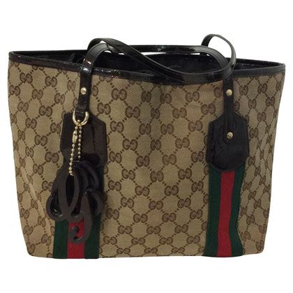 sell used designer clothes gucci|gucci factory outlet online sale.